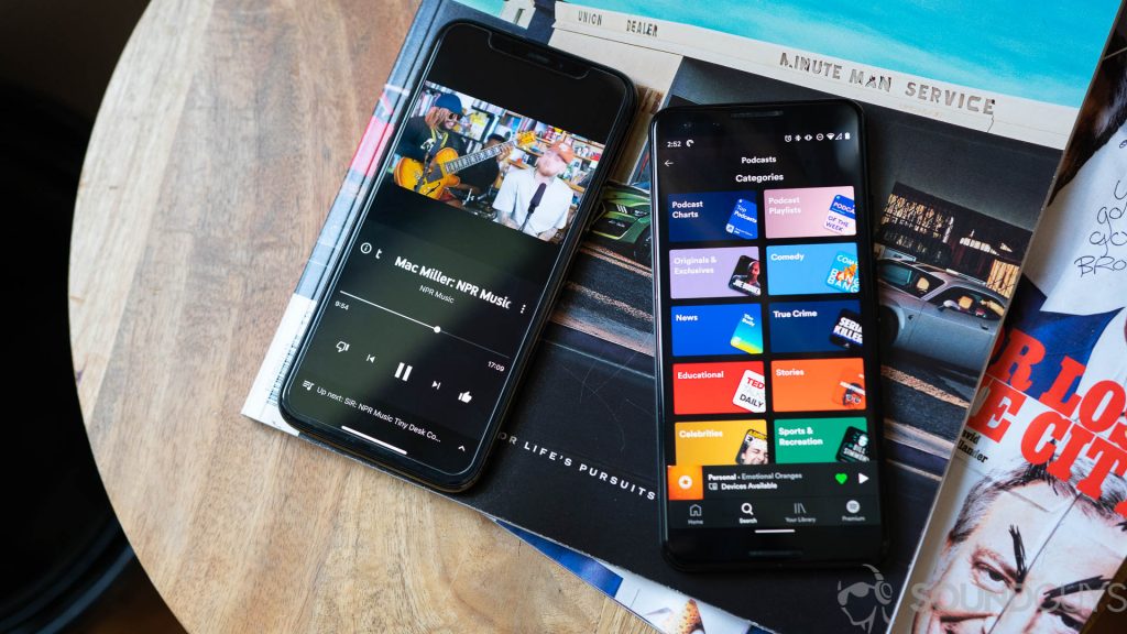 Pictured is an iPhone 11 Pro running YouTube Music next to a Pixel 3 running Spotify.