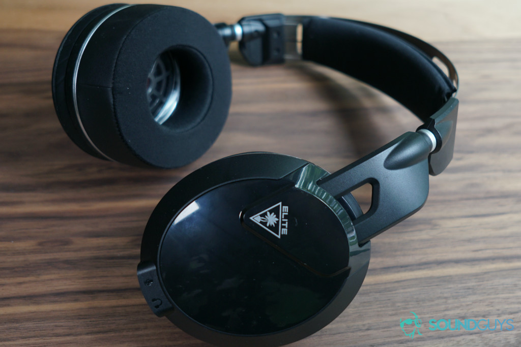 The Turtle Beach Elite Pro 2 sits on a wooden table