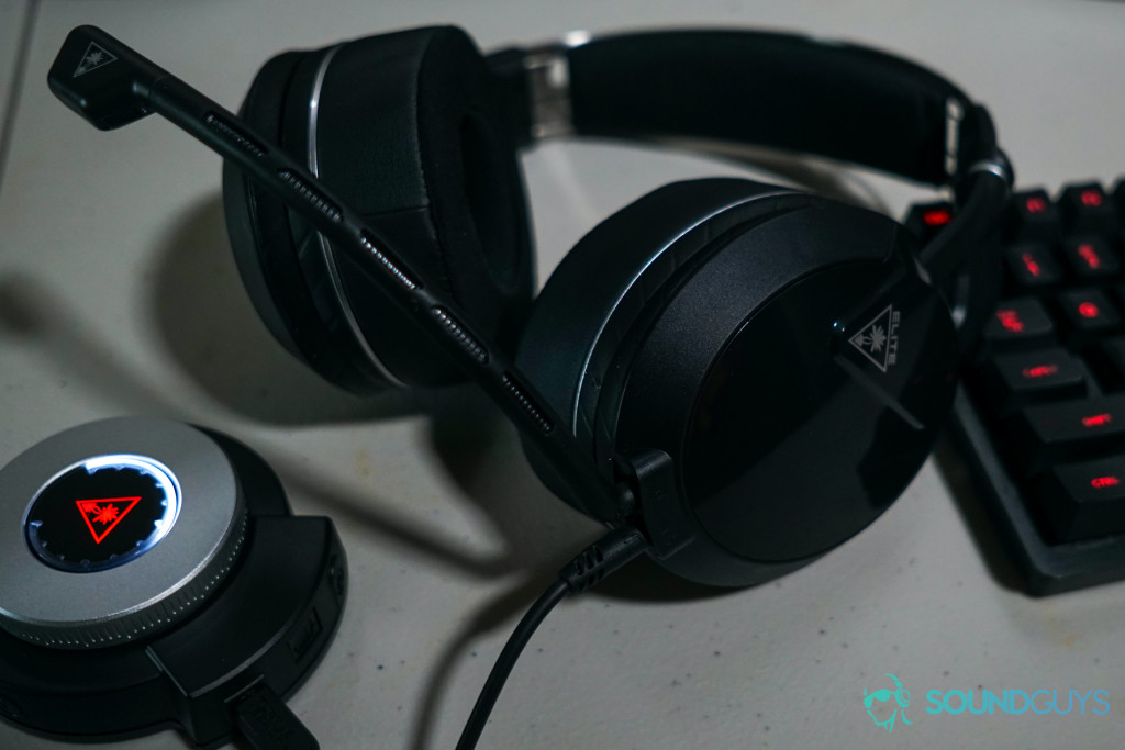 The Turtle Beach Elite Pro 2 gaming headset sits next to its SuperAmp unit and a Logitech Gaming mechanical keyboard.