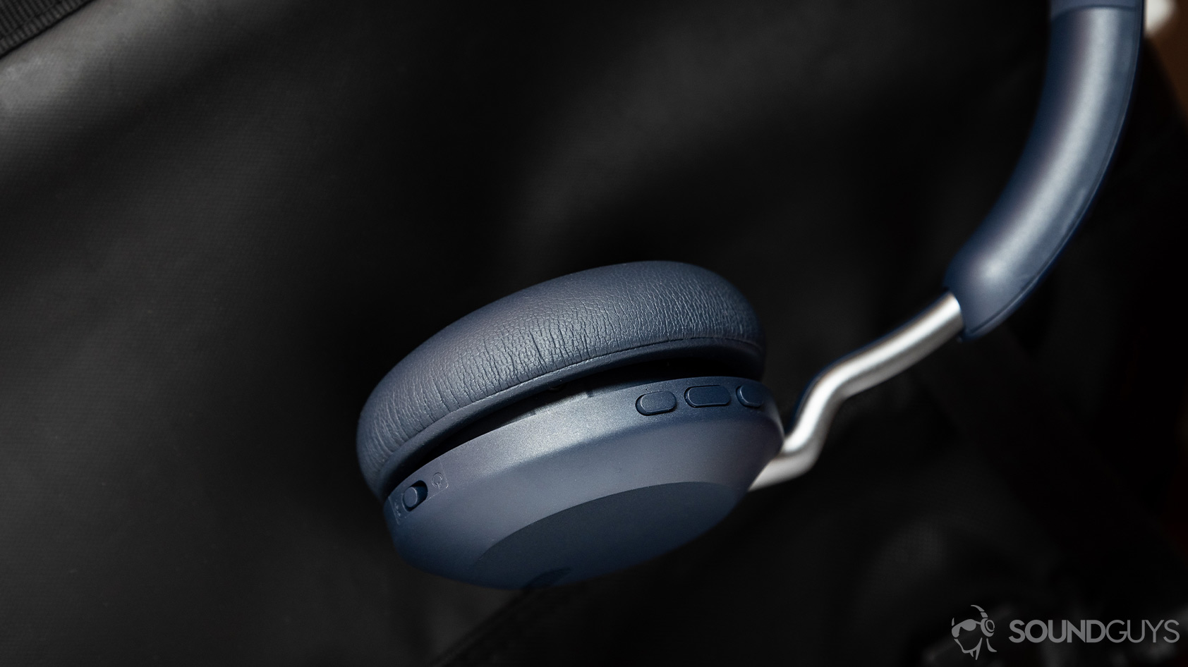 A picture of the Jabra Elite 45h on-ear Bluetooth headphones right ear cup to display the onboard button controls and Bluetooth toggle.