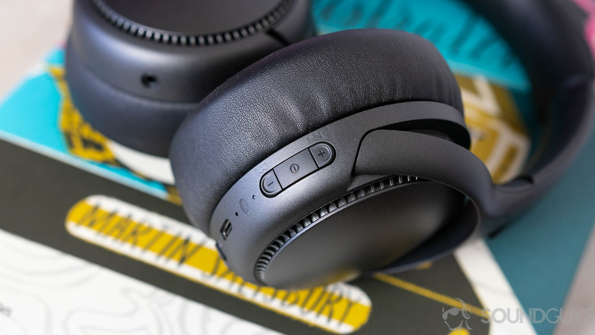 Close-up shot of the playback controls for the Panasonic RB-M700B headphones.