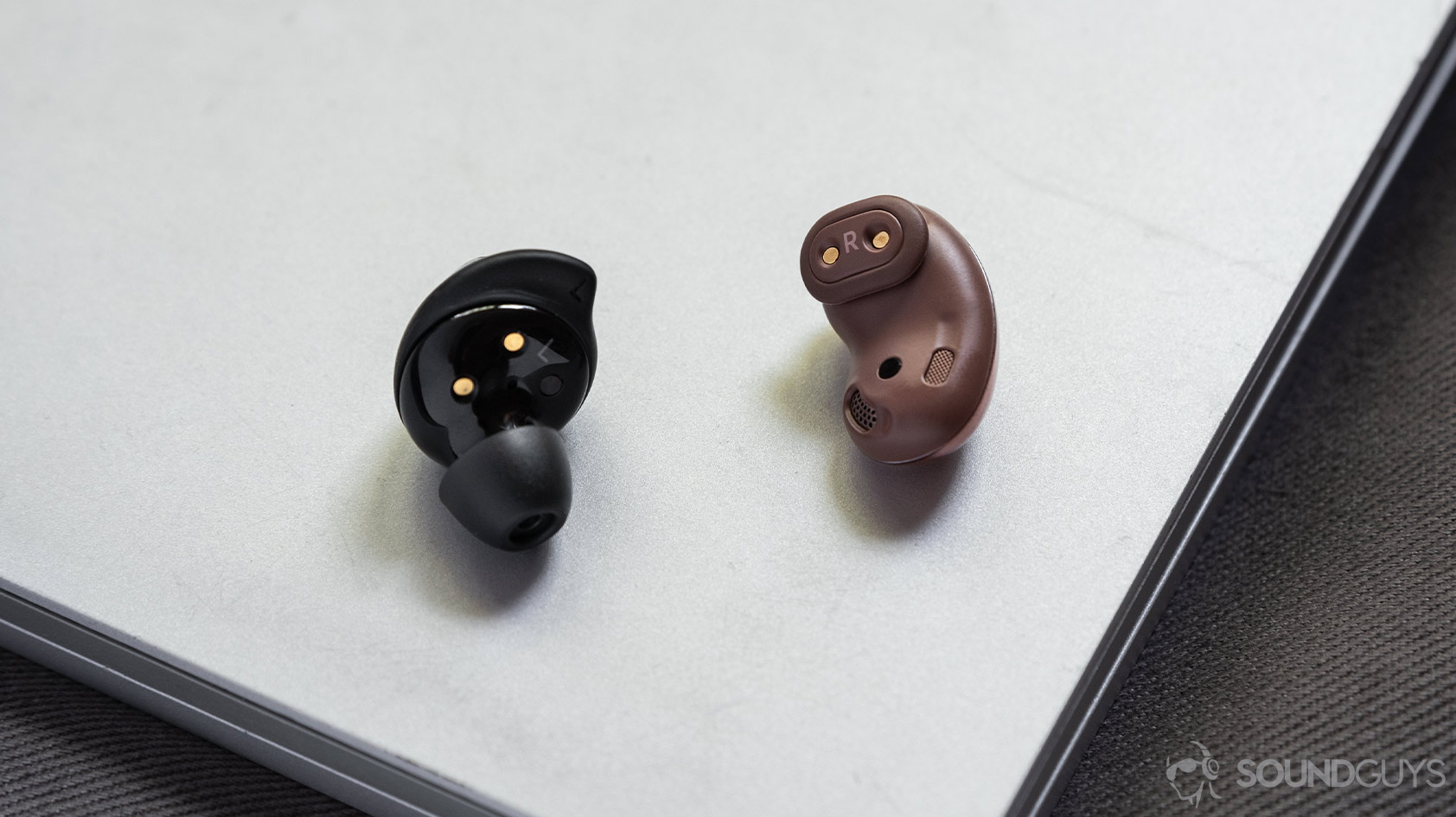A picture of the Samsung Galaxy Buds Plus vs Samsung Galaxy Buds Live comparison of the true wireless earbuds' wing tips.