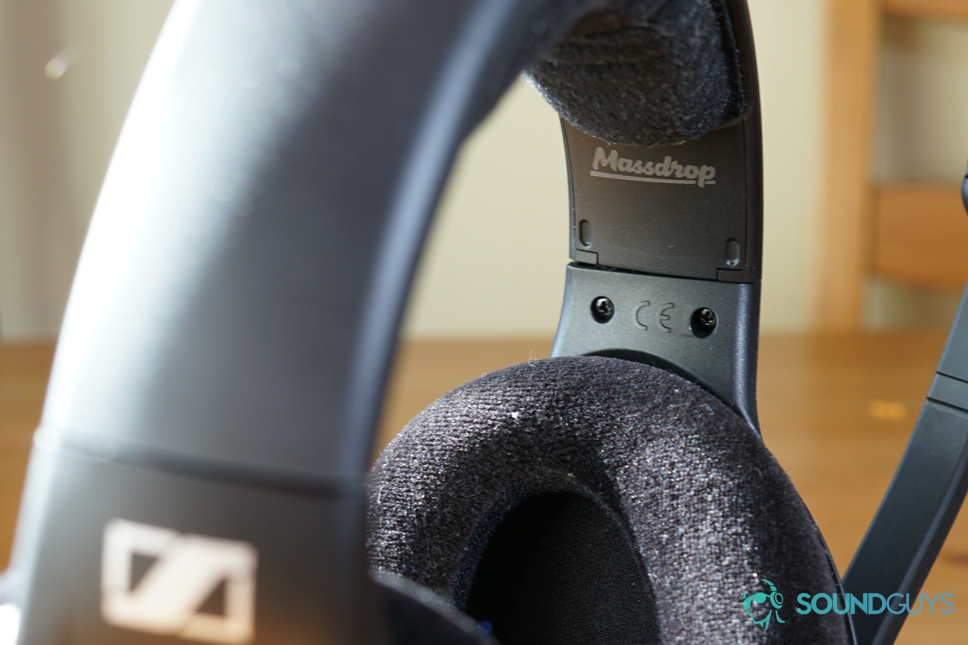 A close up shot of the Sennheiser PC37X gaming headset, highlighting both the Sennheiser and Massdrop logos.
