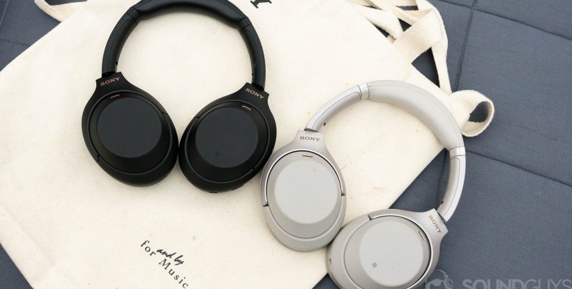 The Sony WH-1000XM4 and Sony WH-1000XM3 headphones sit on a canvas bag next to eachother.