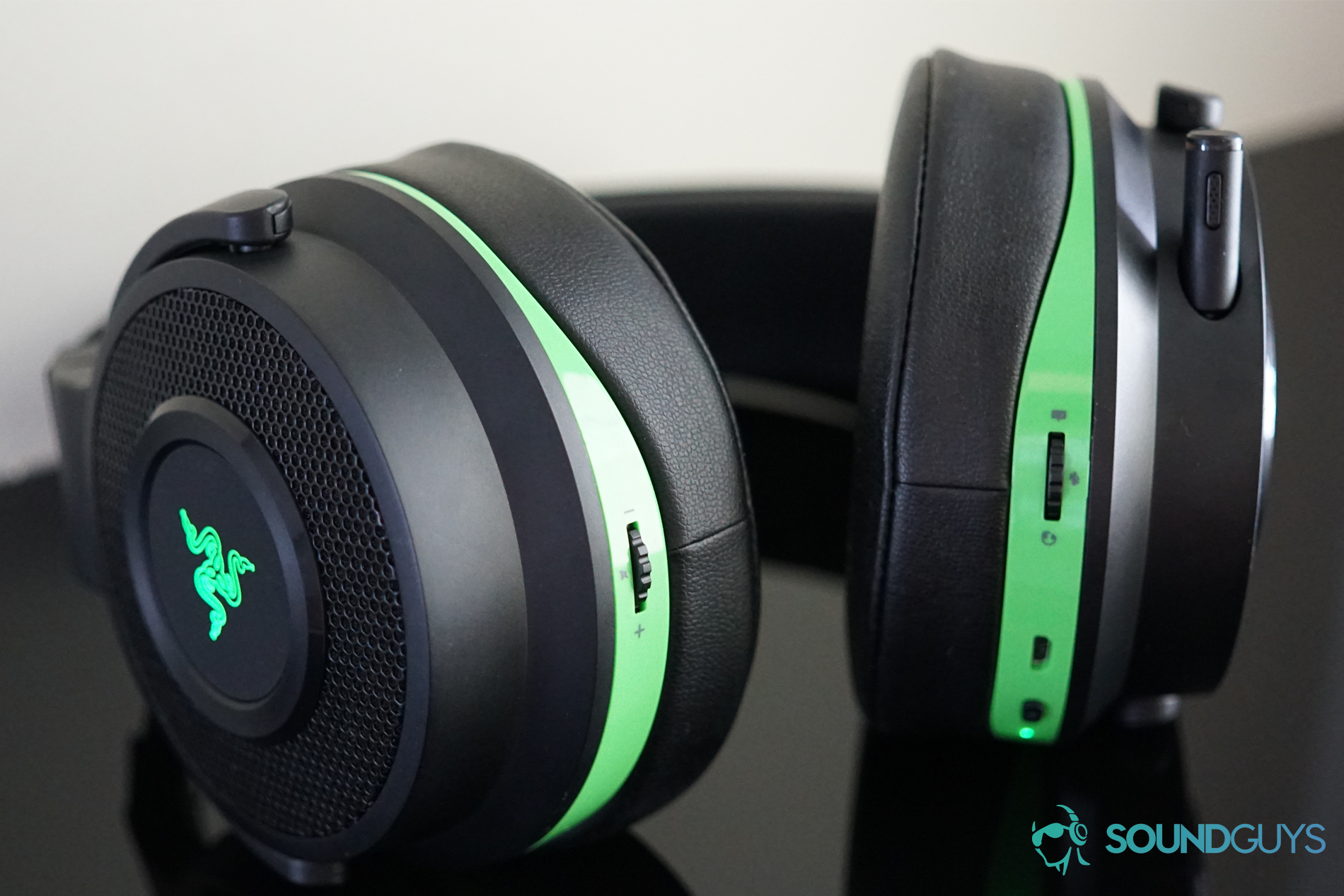 Thresher 3 A close-up shot of the bottom edge of the Razer Thresher Ultimate gaming headset, which shows its on-ear controls.