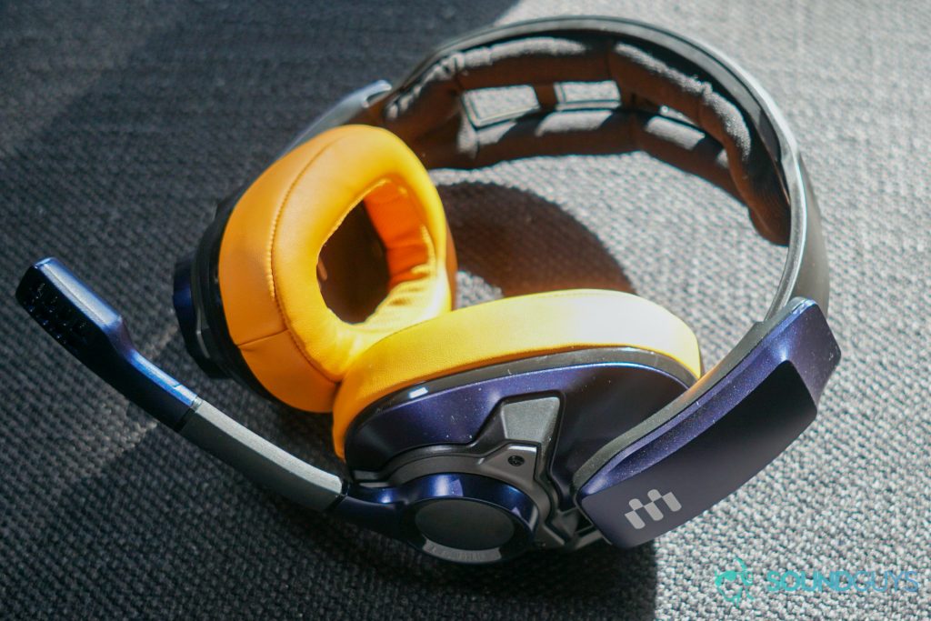 The EPOS Sennheiser GSP 602 gaming headset sits in the sunlight on a fabric surface