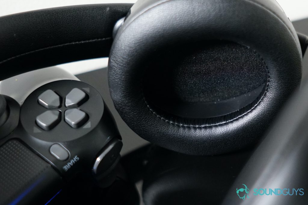 The Playstation Gold Wireless Headset leans on a dualshock 4 controller