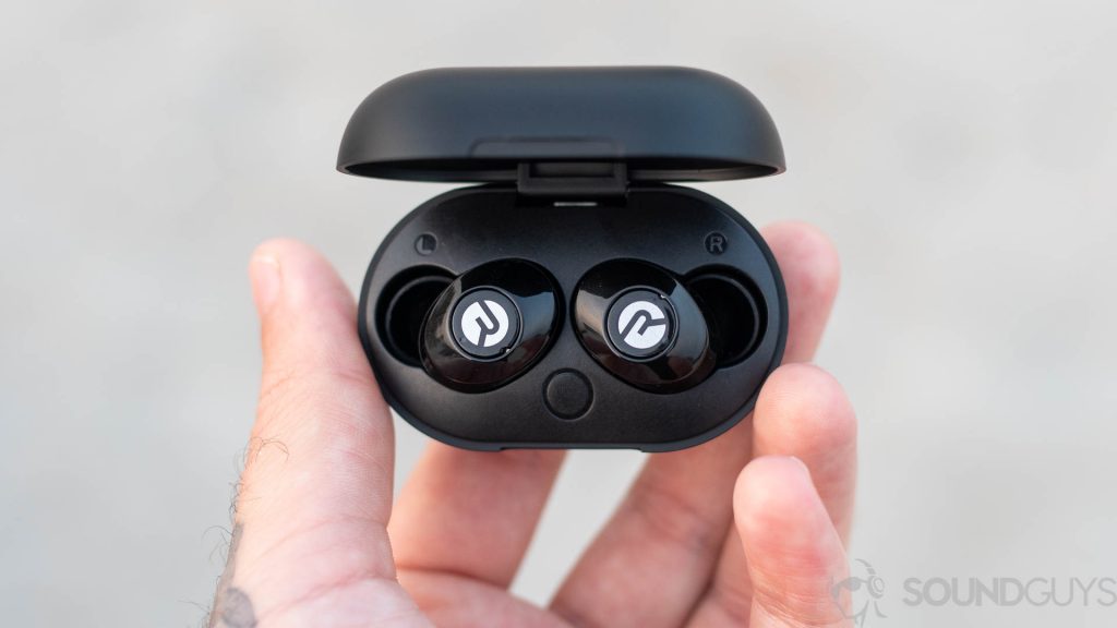Man holding the Raycon E25 earbuds in the open case