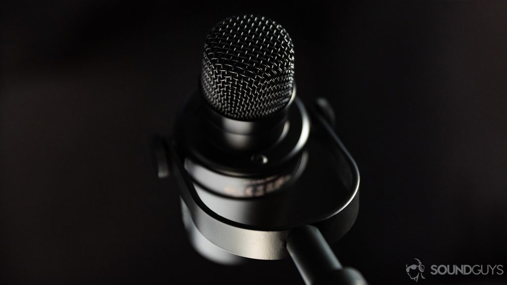 The Shure MV7 USB microphone without the windscreen installed to reveal the recording capsule.