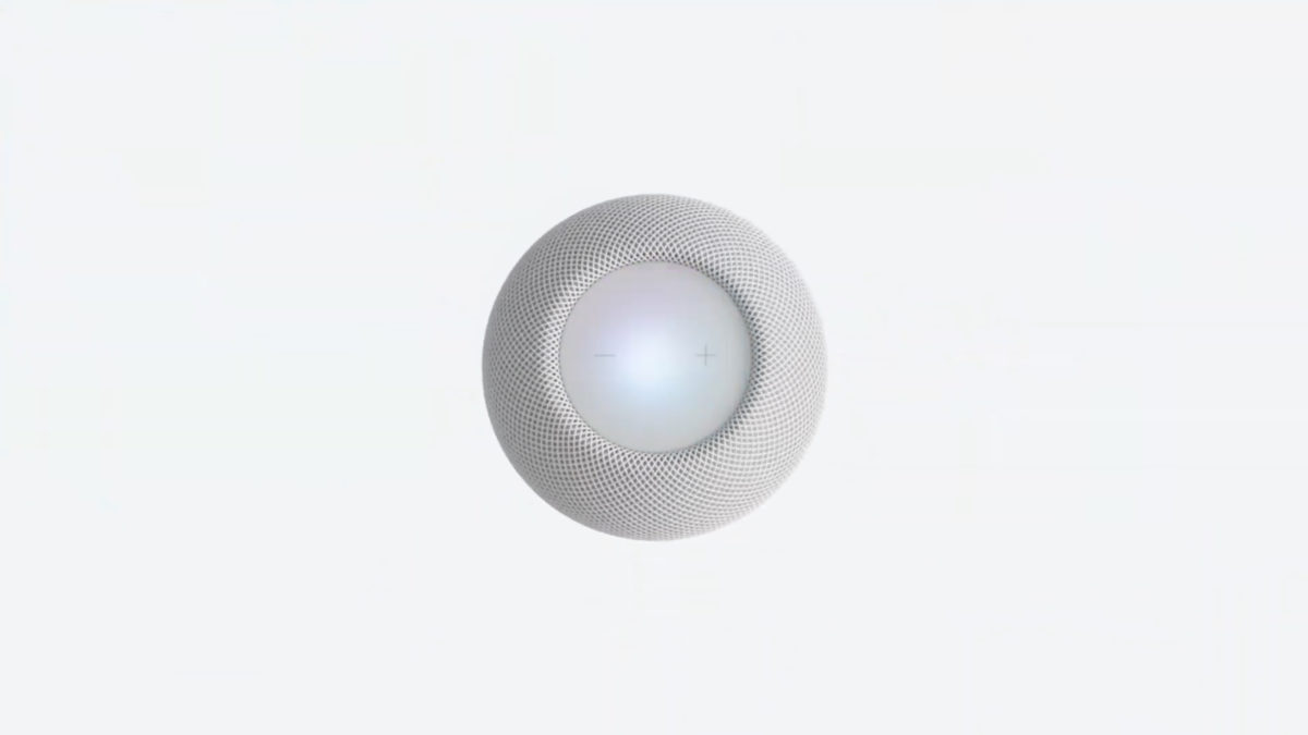 The all-white HomePod Mini from above on a white background.