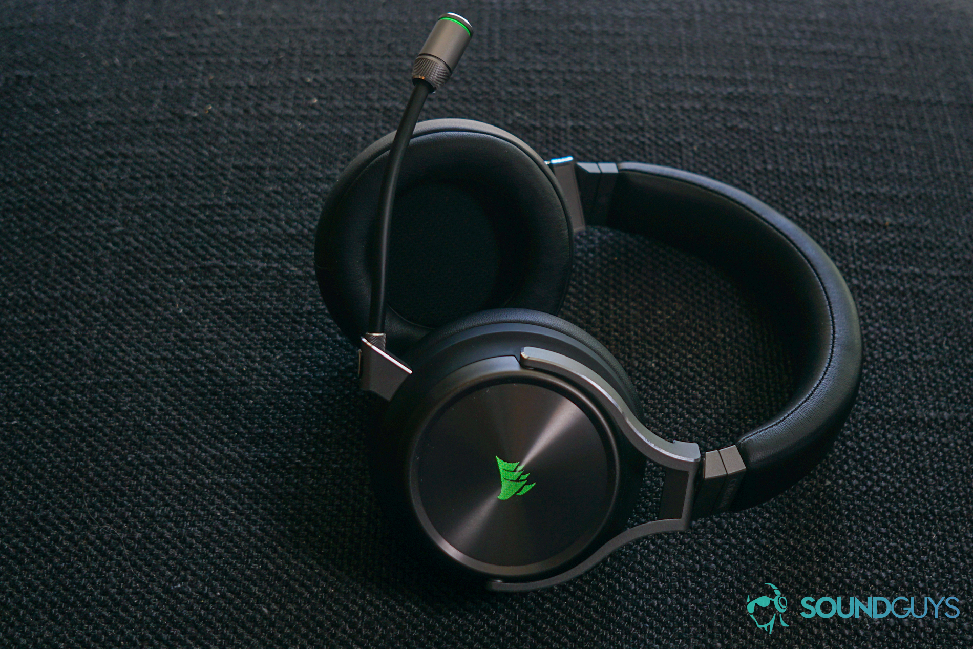 The Corsair Virtuoso Wireless SE sits on a fabric surface