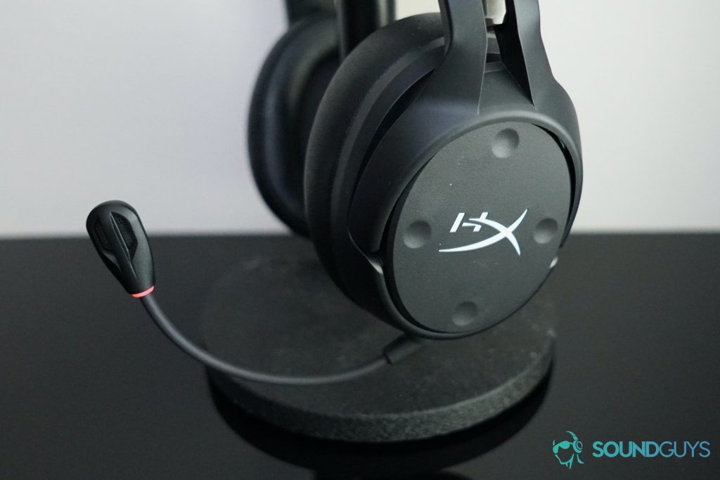 The HyperX Cloud Flight S sits on a stand with its microphone muted.