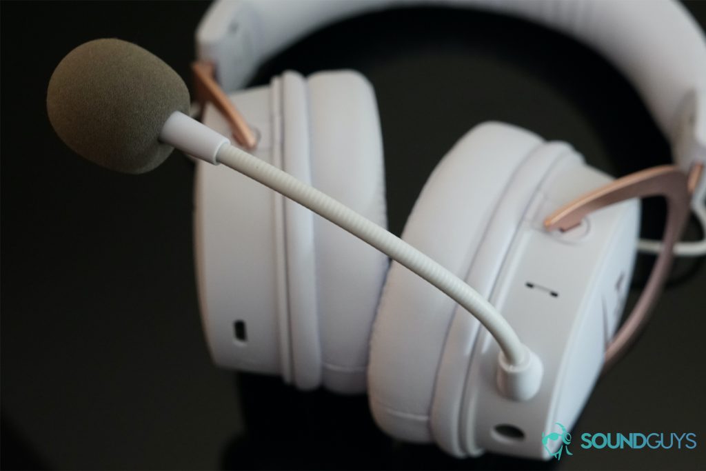 The HyperX Cloud Mix lies on its back, displaying its detachable mic.