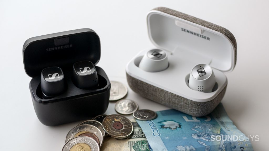 The Sennheiser CX 400BT next to the Sennheiser Momentum True Wireless 2.0 on top of cash.