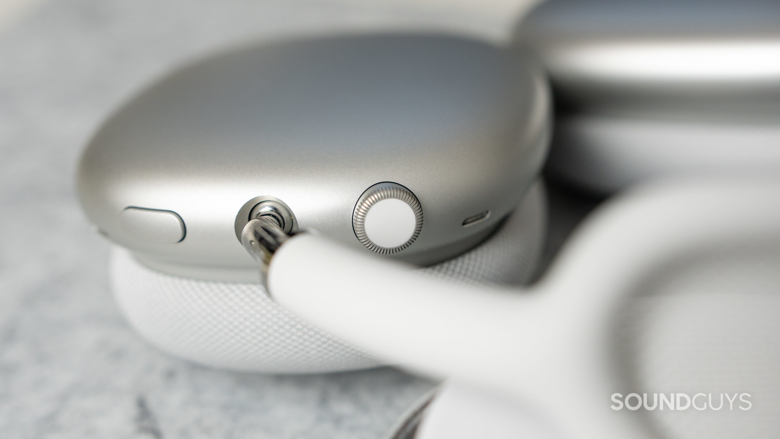 Close-up of the digital crown at the top of the Apple AirPods Max right ear cup.