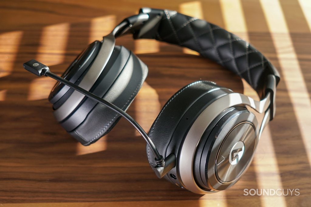 LucidSound LS50X lays on a wooden table with sunlight coming in through blinds.
