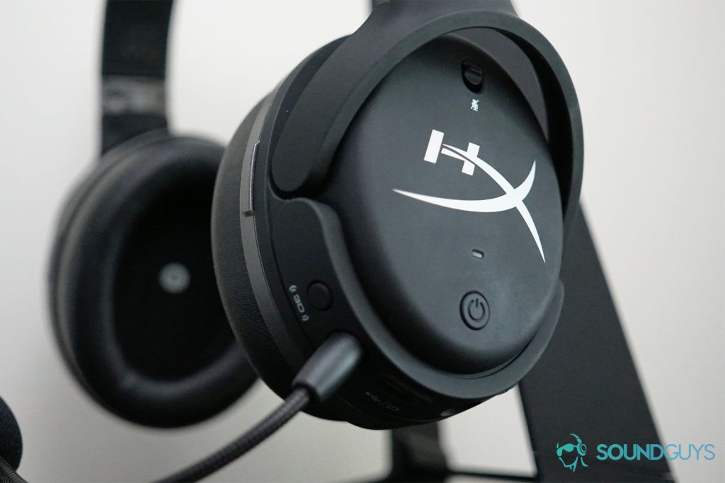A close-up shot of the side of the HyperX Cloud orbit S gaming headset, showing the power button and mic mute switch, as well as the 3D audio button on the side.