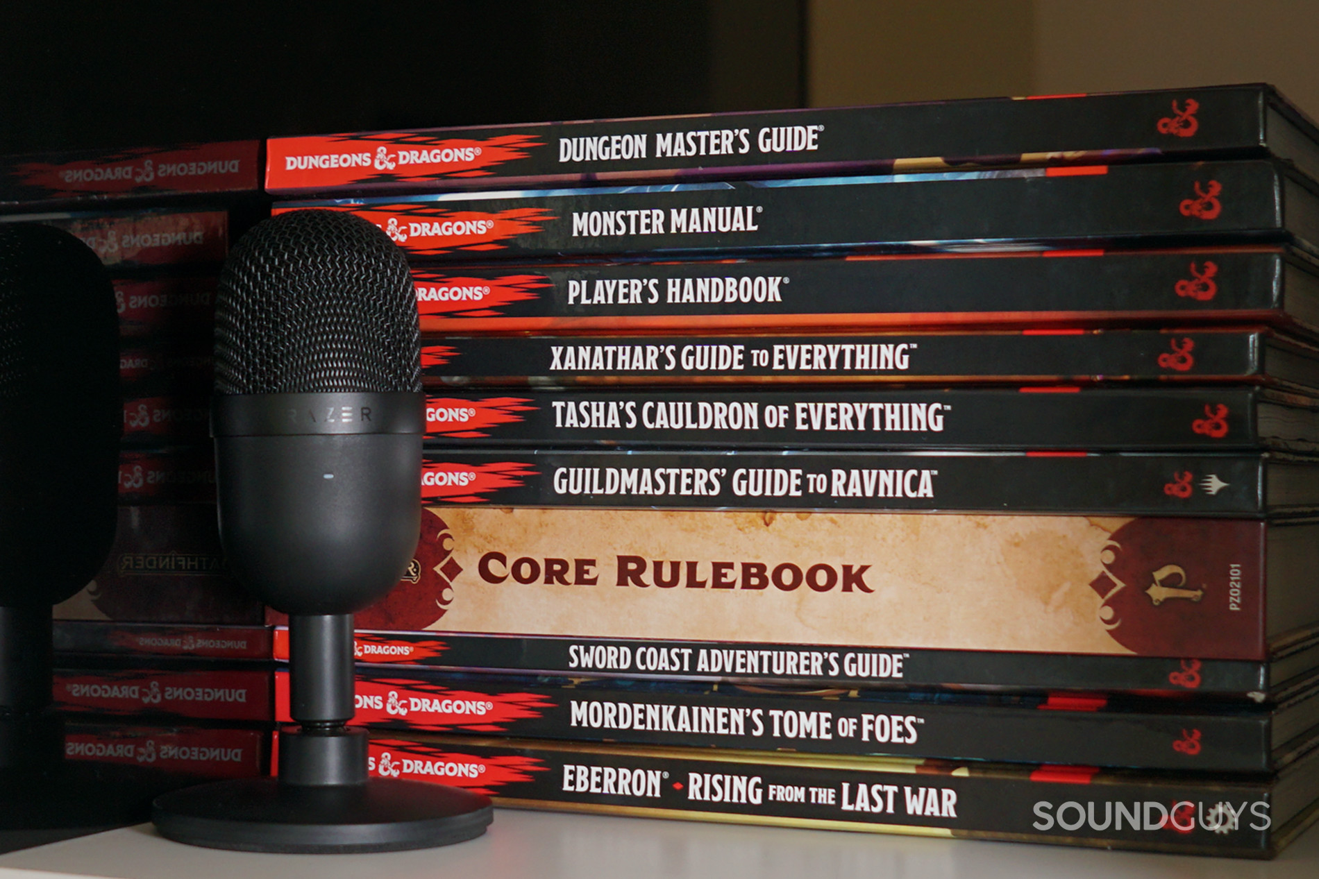 Razer Seiren Mini against a stack of DnD books.