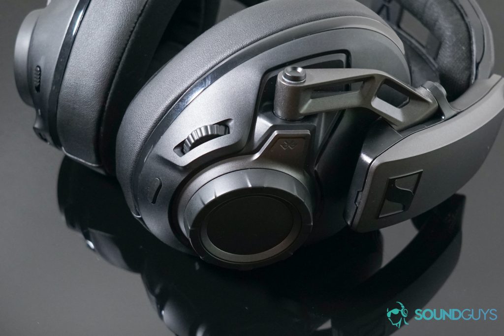 The Sennheiser GSP 670 gaming headset lays on a black reflective surface.