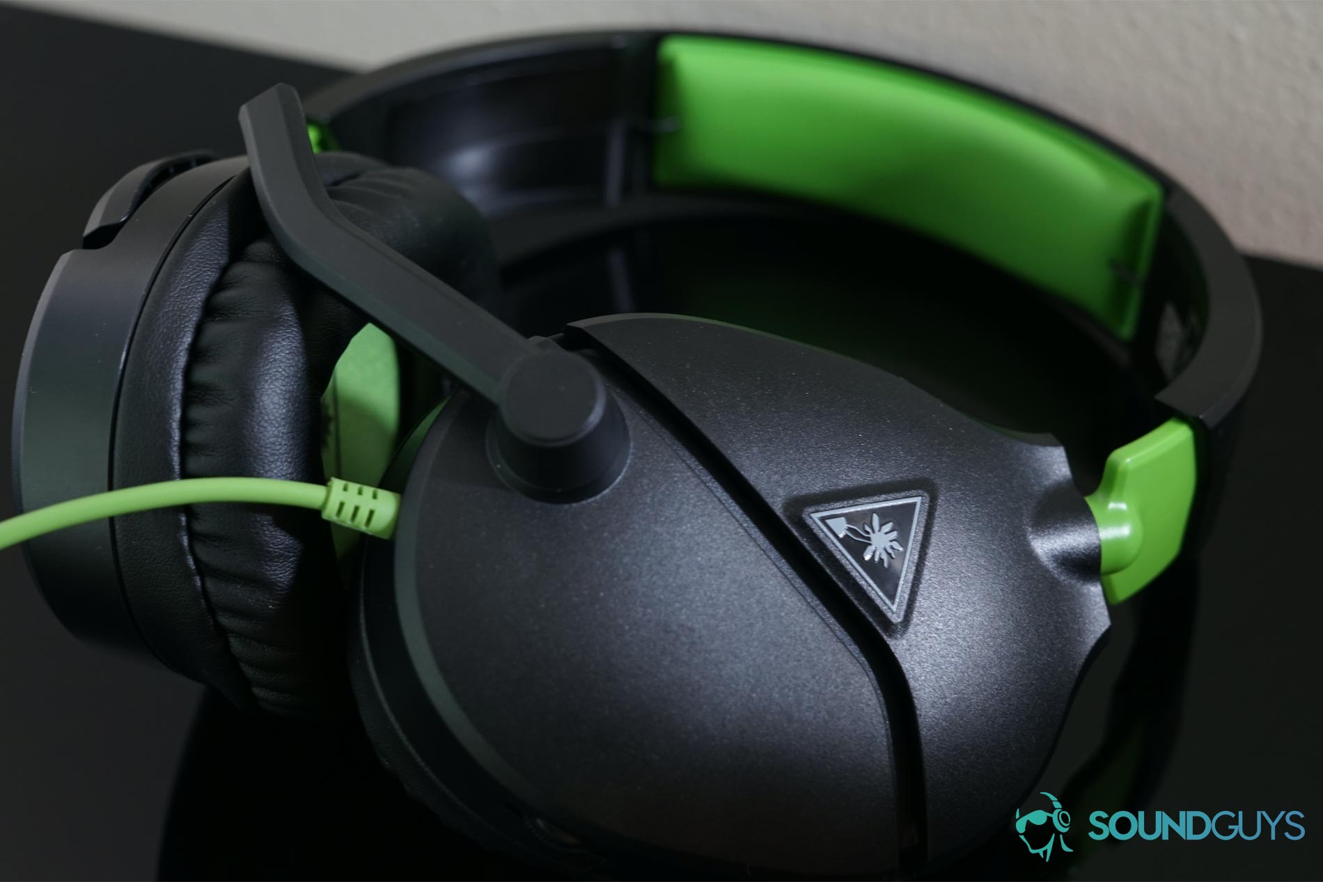 The Turtle Beach Recon 70 gaming headset ear cup and microphone.