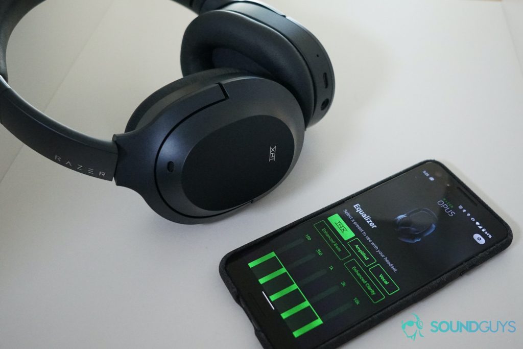 The Razer Opus sits on a shelf next to a Google Pixel 3 running the Razer Opus app.