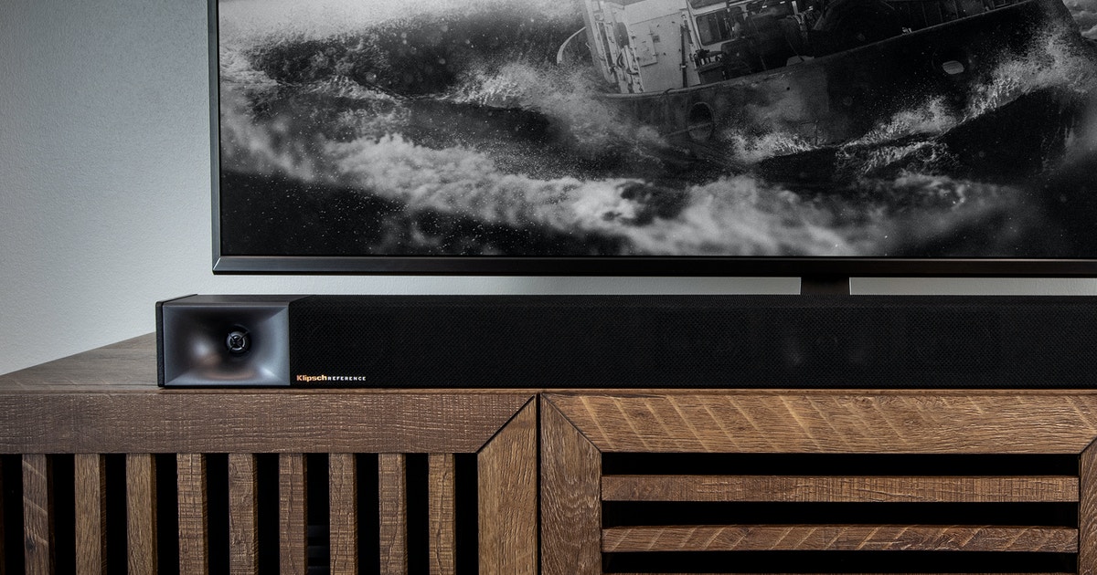 Klipsch Cinema 400 soundbar on a TV stand.