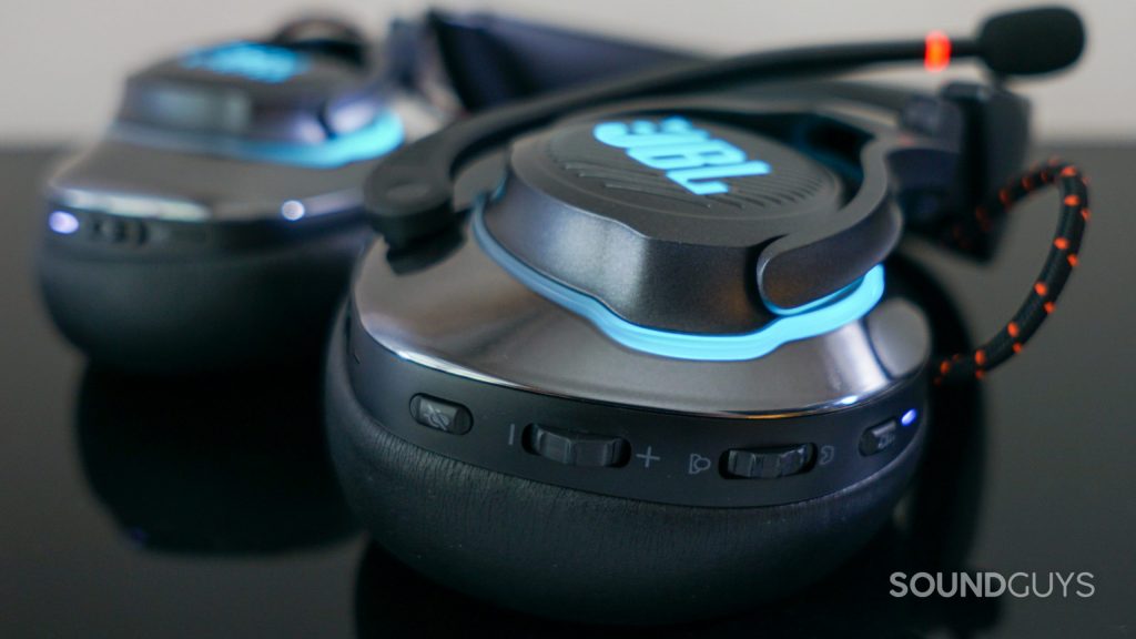 The JBL Quantum 800 lays on a flat black surface with its controls in view.
