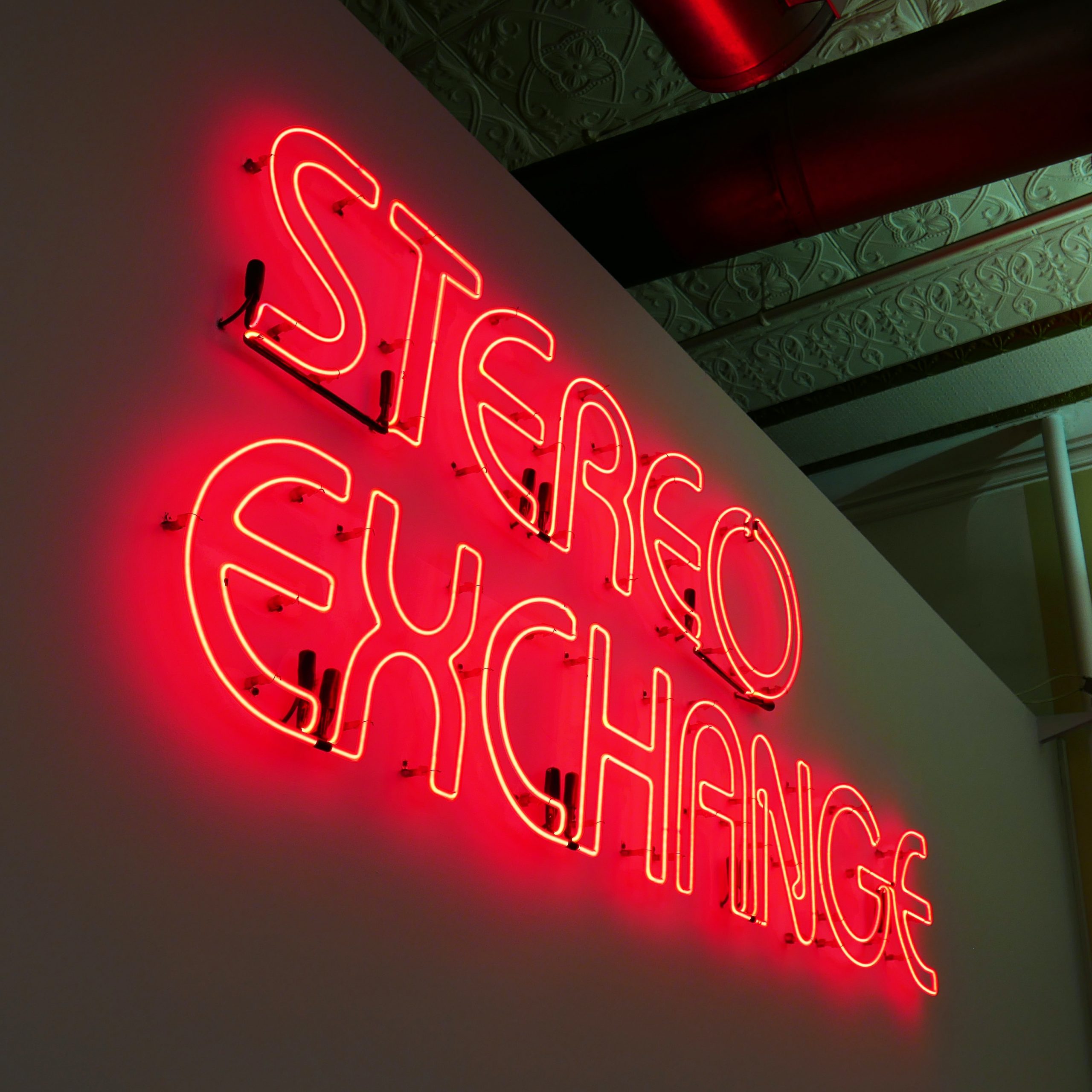 ingo-schulz-_TL5bowIN8Y-unsplash Neon 'Stereo Exchange" sign