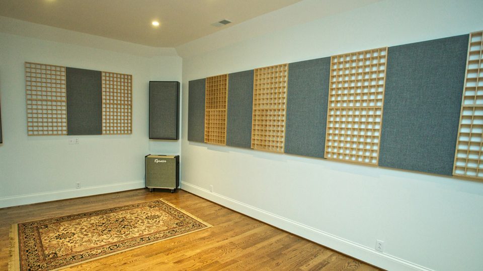 Acoustically treated room featuring alternating absorbers and diffusers.