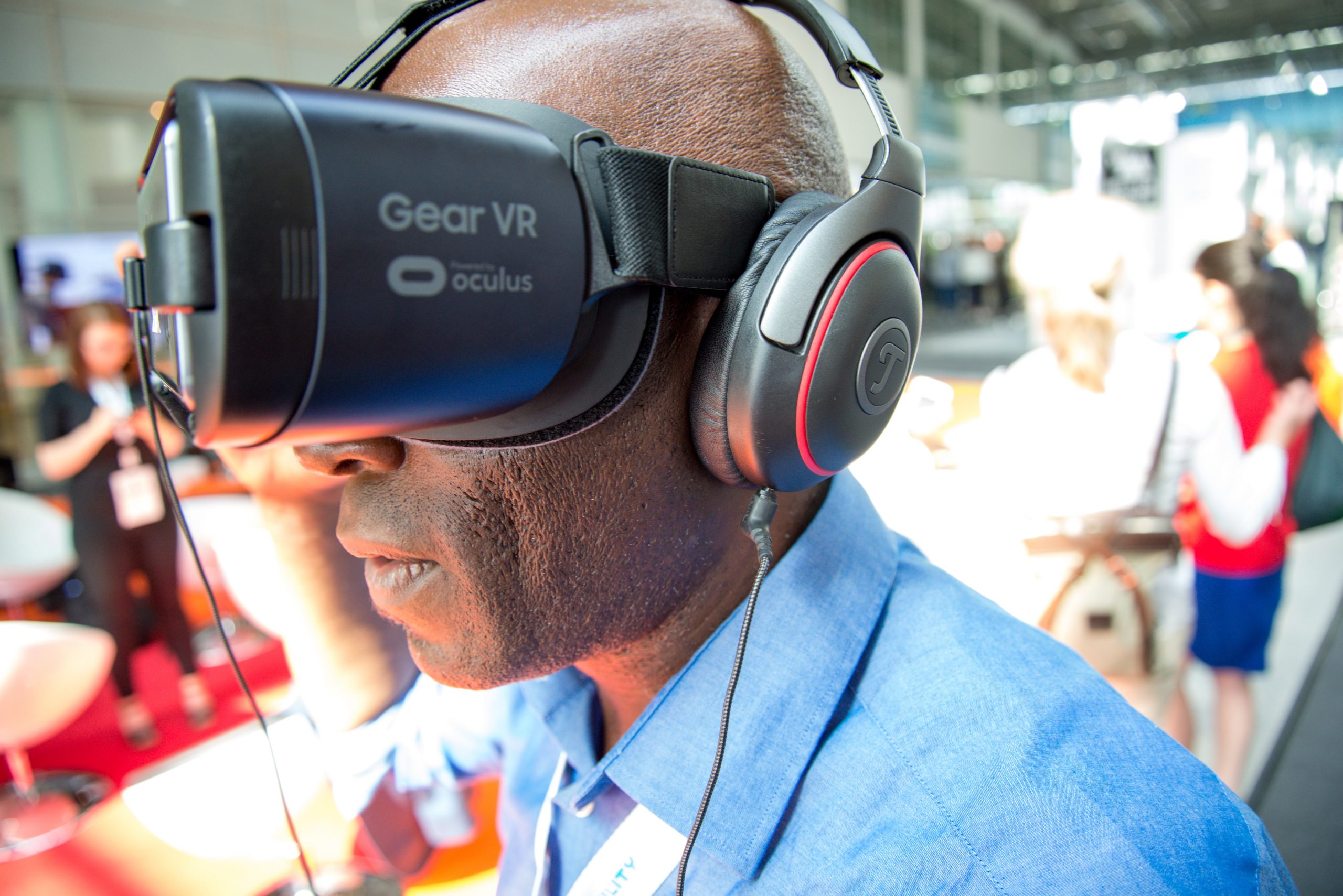 Man wearing headphones and VR googles