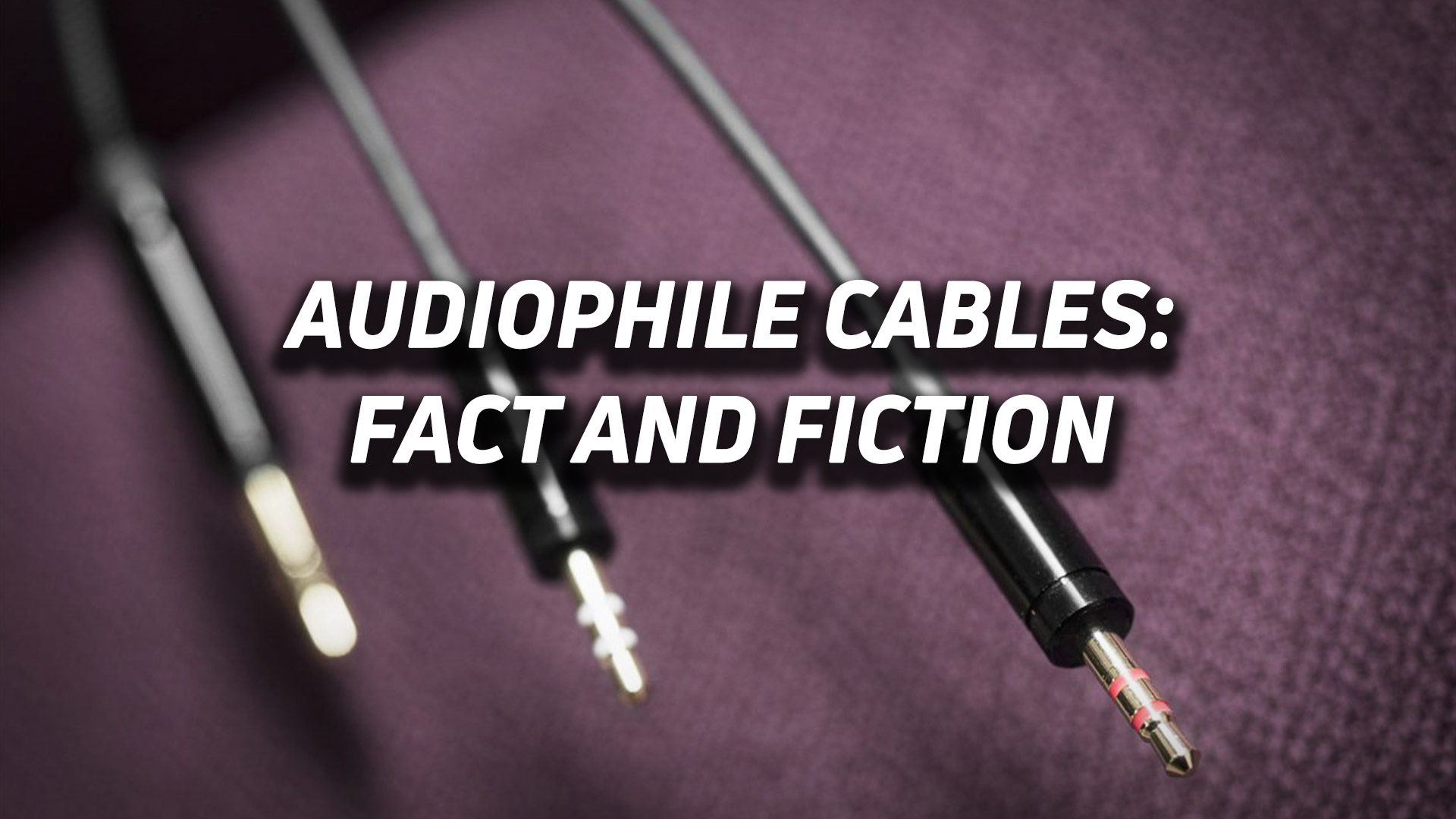 A line of 3.5mm headphone cables against a purple background with the text "Audiophile cables: fact and fiction" overlaid.