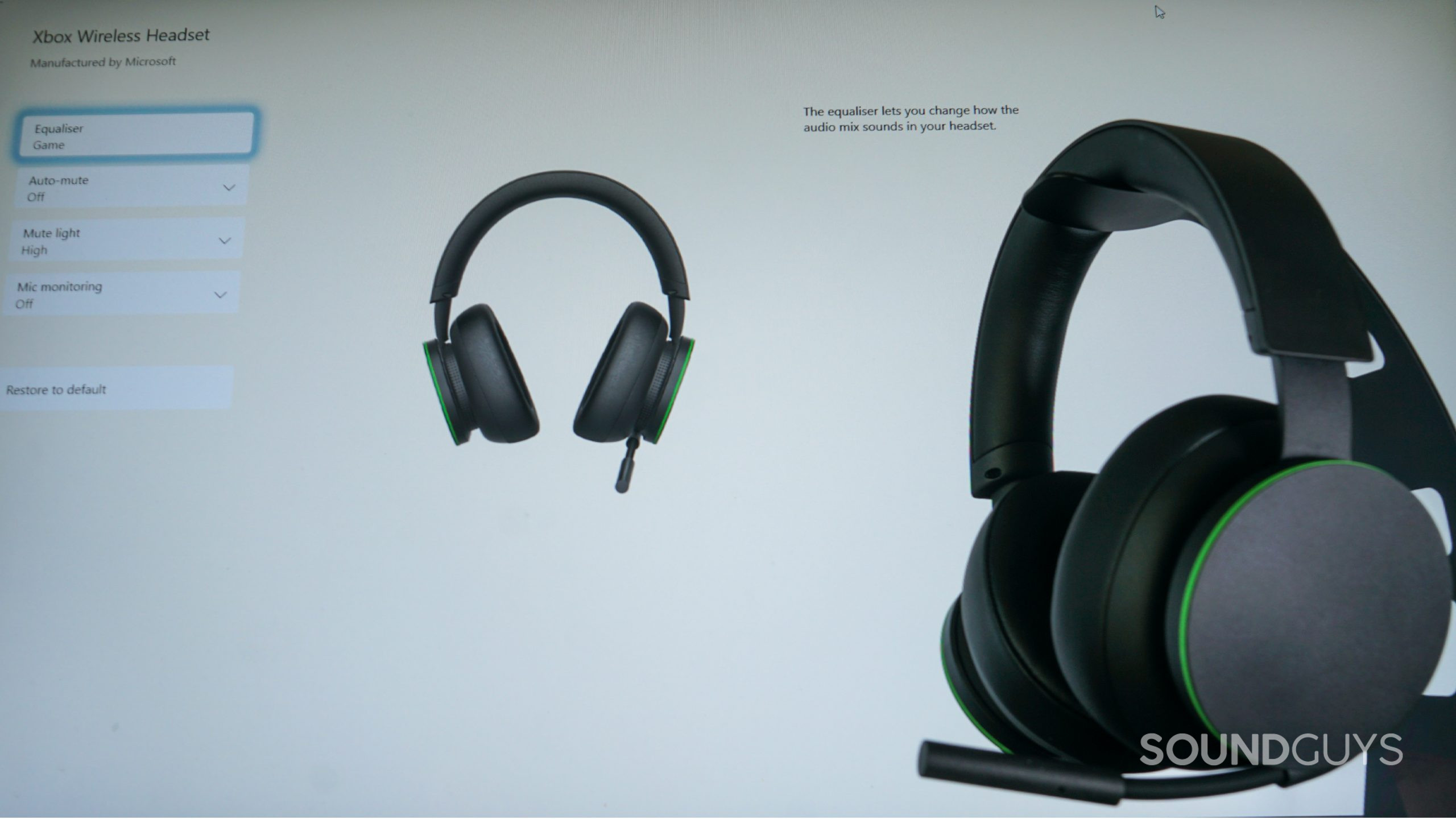 The Microsoft Xbox Wireless Headset sits on a stand in front of a Viewsonic monitor running the Xbox Accessories Windows desktop app.