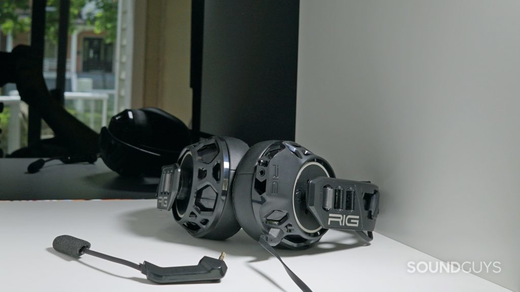 The Nacon RIG 500 Pro HC lays on a white shelf in front of a reflective surface.