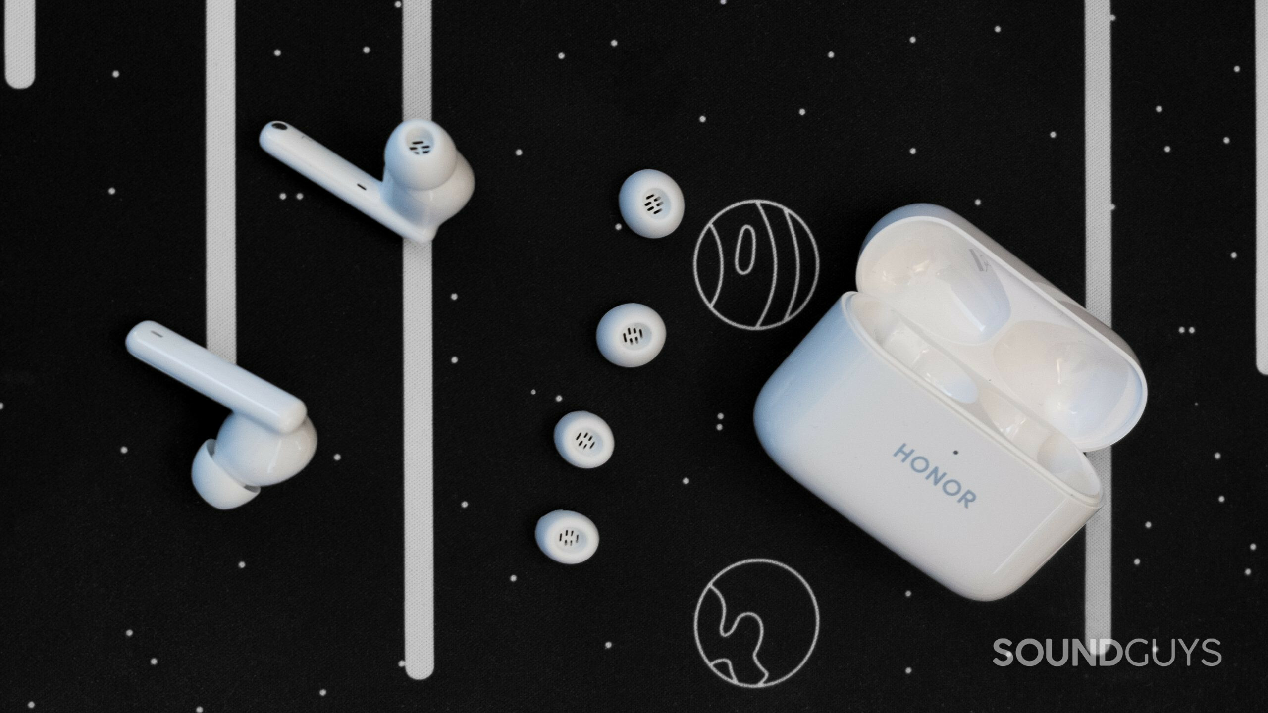 honor earbuds 2 lite shown on a space background with eartips