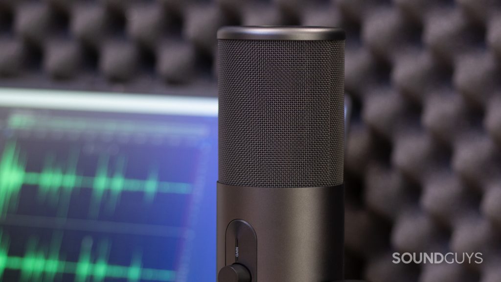 Grille and gain knob of EPOS B20 in a recording studio with a DAW open in the background.