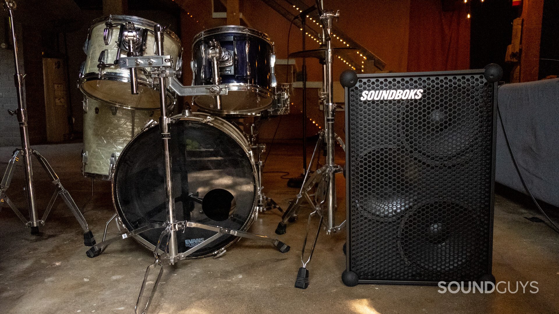 soundboks-review-front-scene Front of SoundBoks (Gen. 3) beside a drum kit.