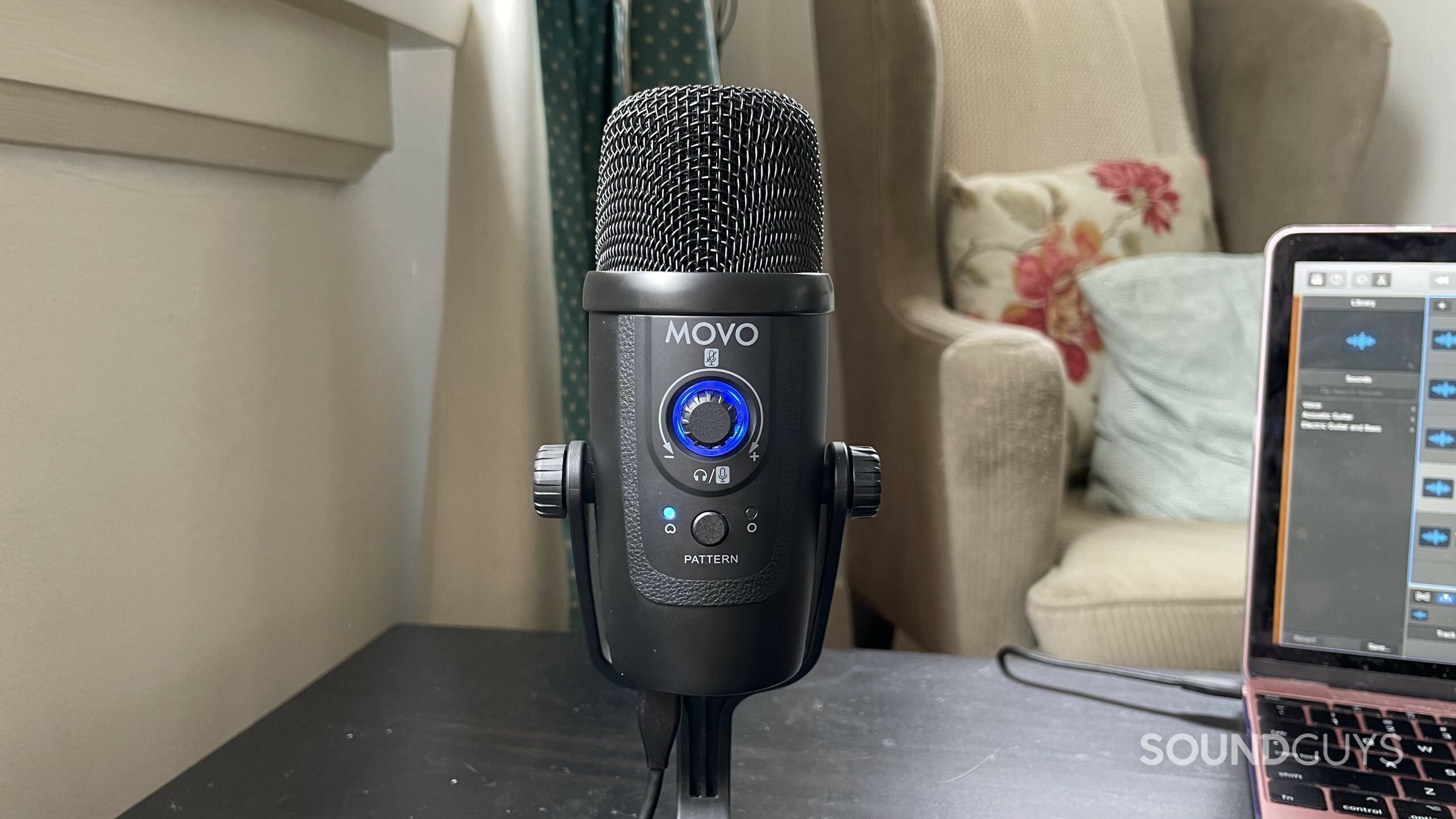 MovoUM300+front Movo UM300 on a table. An armchair and a laptop with Garageband open are visible in the background.