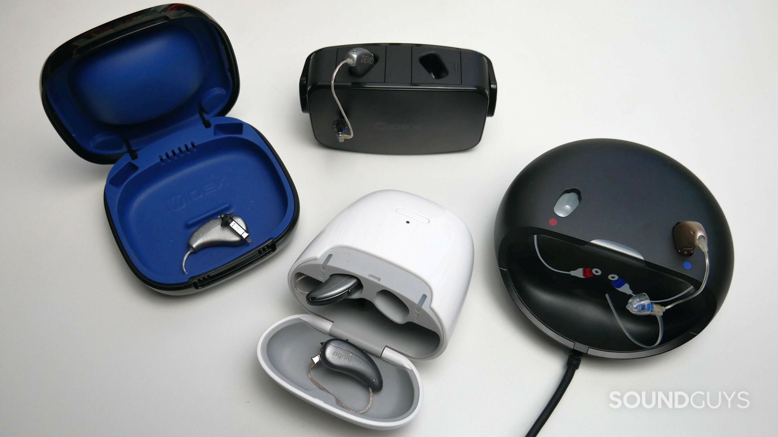 Different types of receiver-in-canal hearing aids by Signia, Widex. and Oticon.