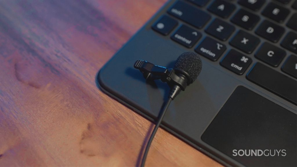 The Sennheiser XS Lav USB-C on top of an Apple Magic Keyboard