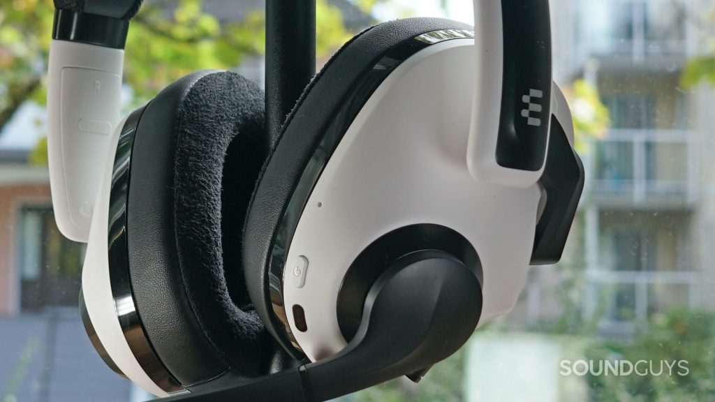 A close up shot of the EPOS H3 Hybrid which shows the internal microphone and the power button.