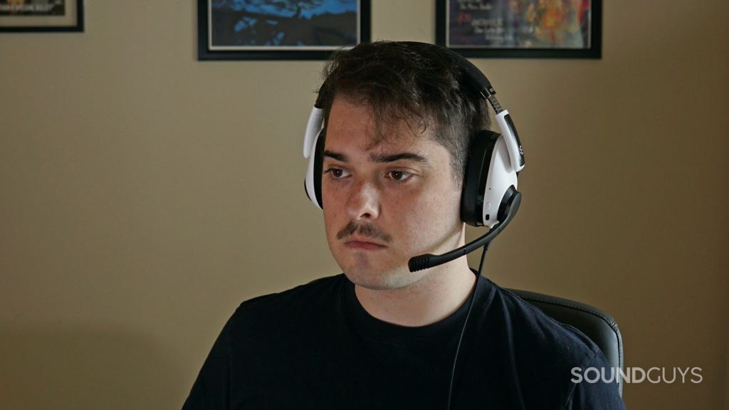 A man wears the EPOS H3 Hybrid.