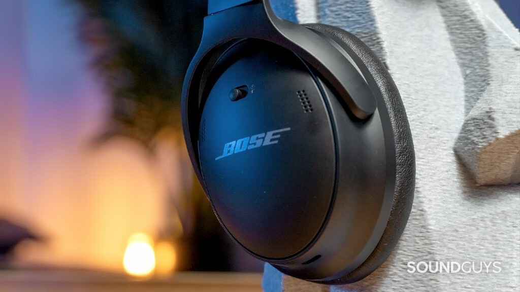 A photo of the Bose QuietComfort 45 resting atop a plastic head.