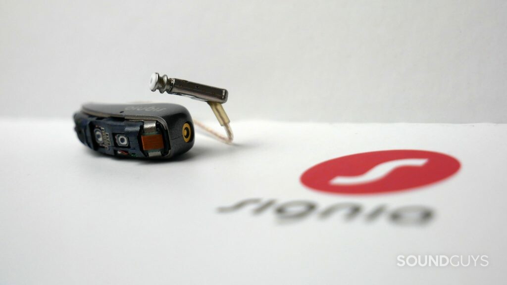 Signia Pure Charge&GO AX hearing aid disassembled to expose it telecoil.
