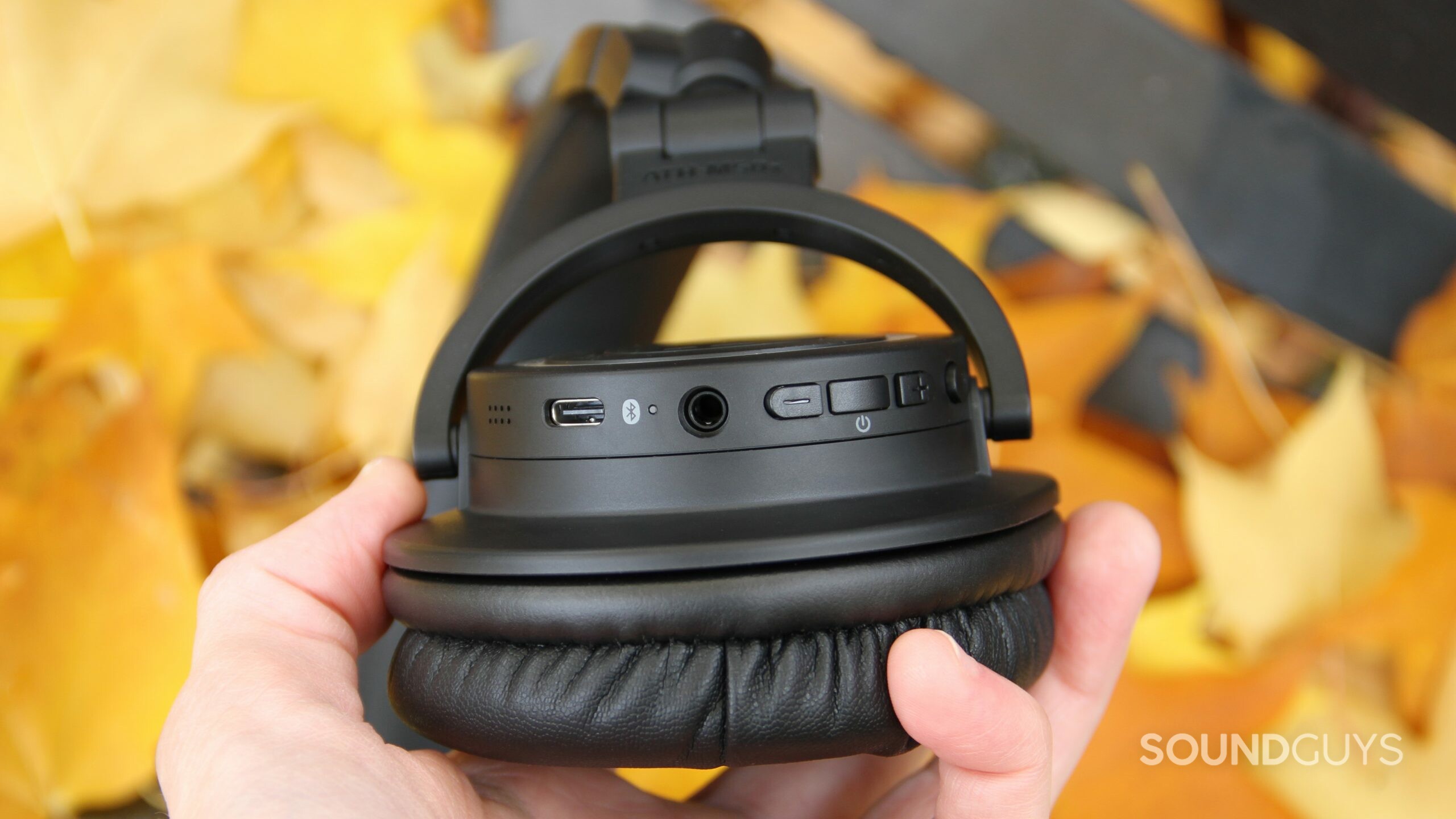 Close up of the buttons and connections on Audio-Technica ATH-M50xBT2 ear cup.