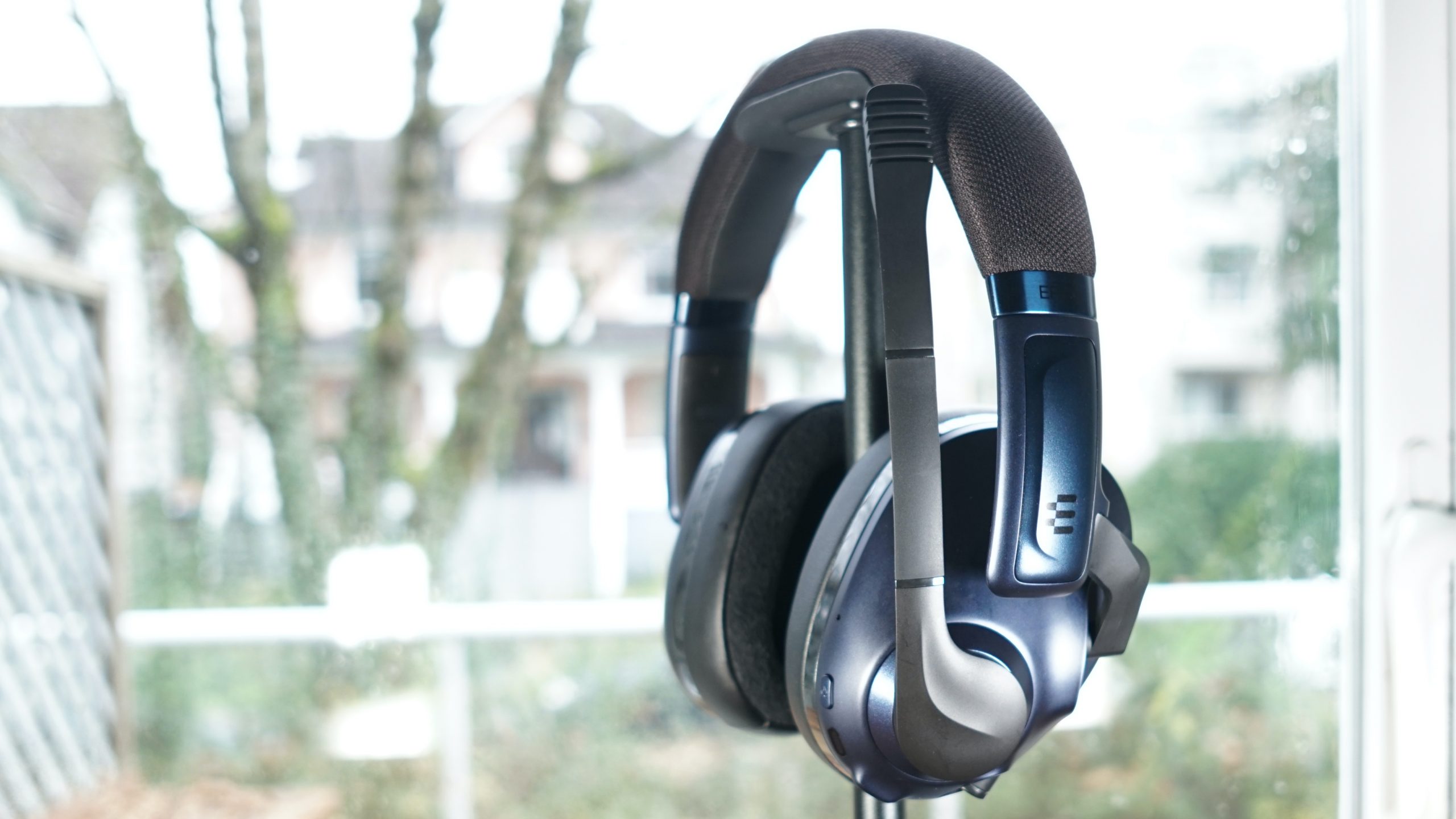 EPOS-H3PRO-Hybrid-stand-shot The EPOS H3PRO Hybrid gaming headset sits on a headphone stand