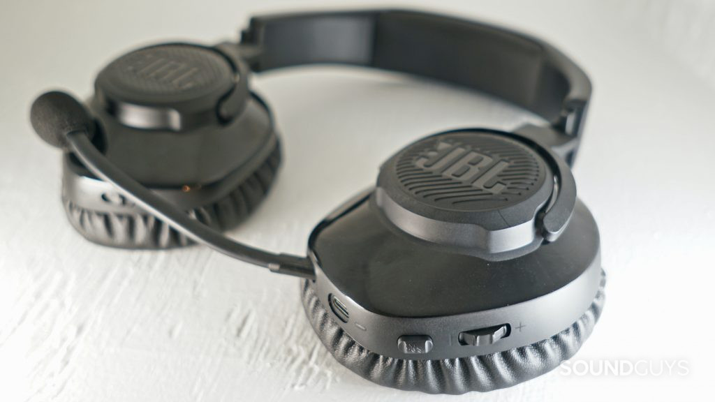 JBL Quantum 350 Wireless headset lays flat on a wooden shelf.