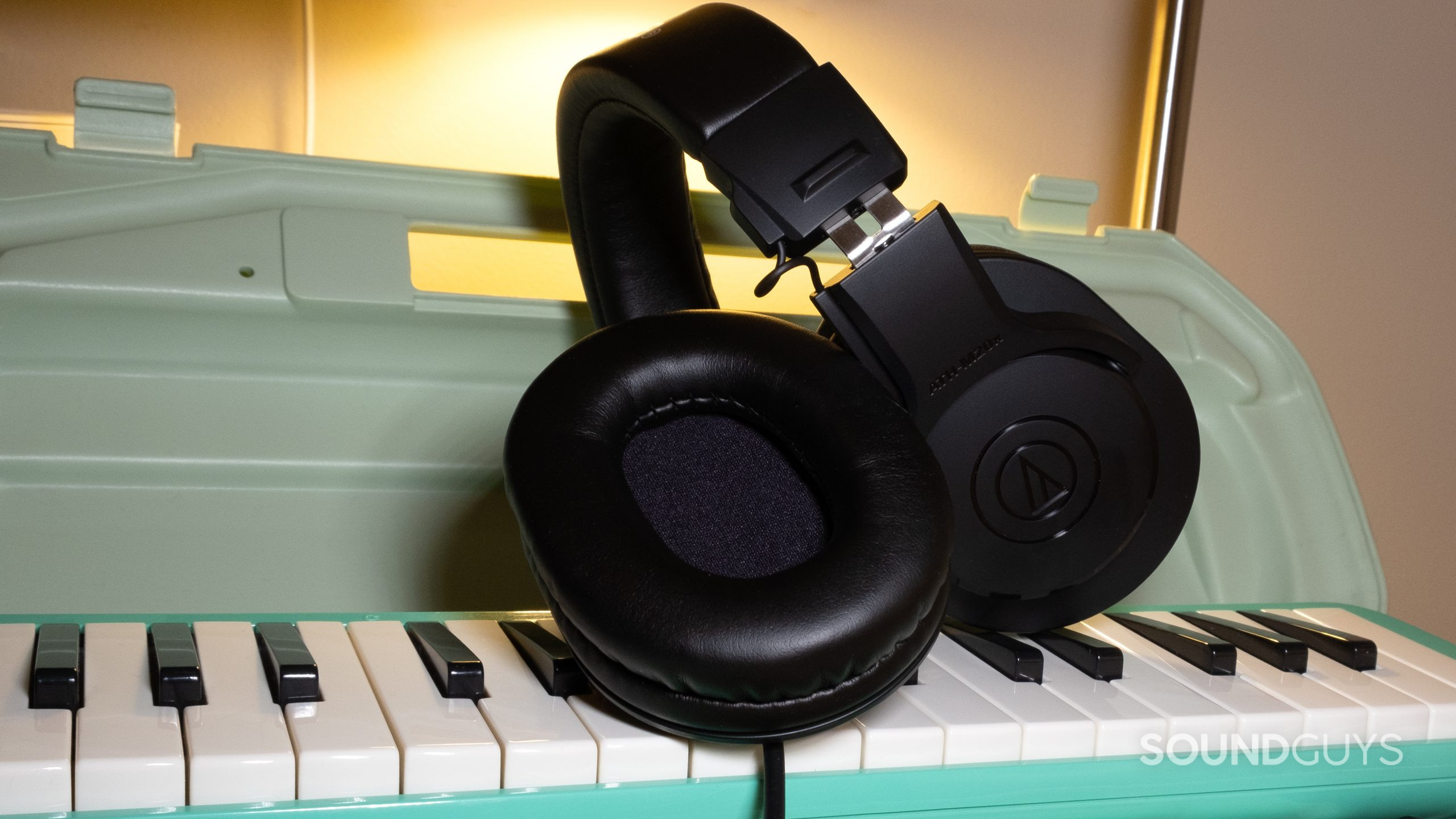 The Audio-Technica ATH-M20x twisted to show the padding and the amount of flex the headset has.