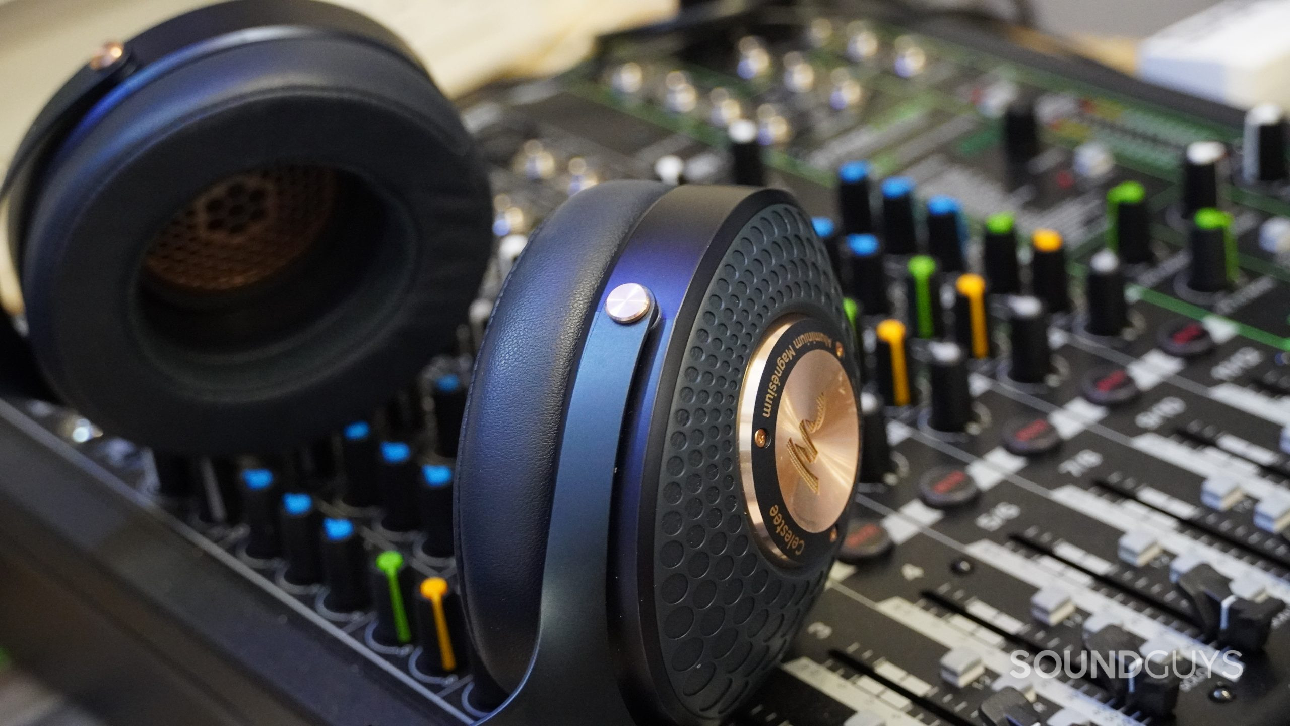 The Focal Celestee headphones resting on top of a mixer.