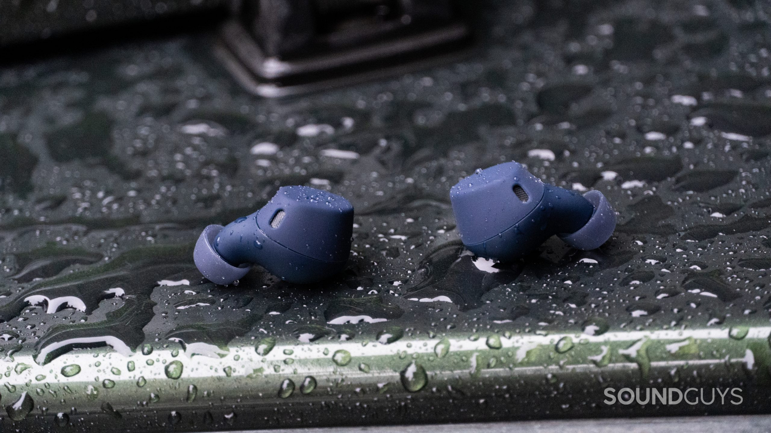 Jabra Elite 7 Active earbuds in the rain.