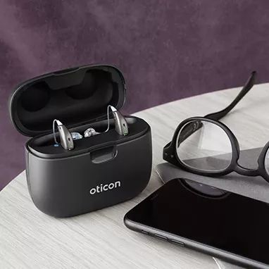 Oticon More in portable charging case.